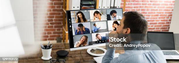Bored Employee In Video Conference Stock Photo - Download Image Now - Video Call, Tired, Boredom