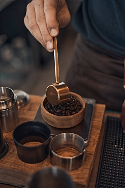 istock Professional barista preparing coffee 1291125440