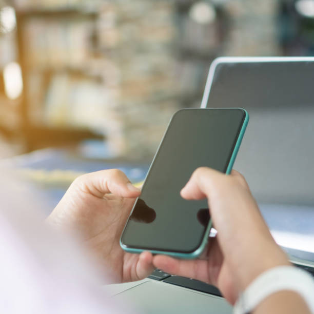 istock Woman hand using smartphone to do work business, social network, communication concept. 1291126148