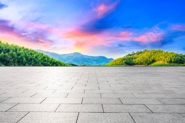 istock Empty floor and green tea plantation with bamboo forest landscape. 1291136448