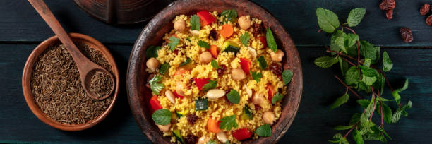 istock Couscous panorama with ingredients, top shot 1291139143