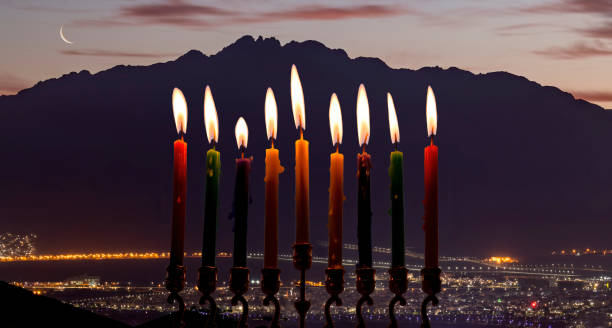 istock Hanukkah Holiday of Light, selective focus on menorah with candles, 1291140901