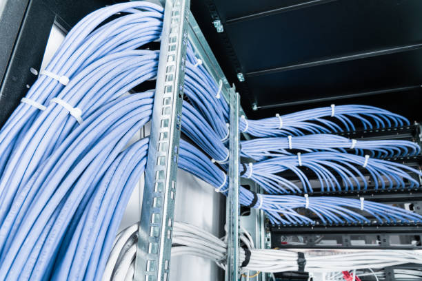 istock large group of UTP cables, Ethernet cables in rack cabinet 1291141028