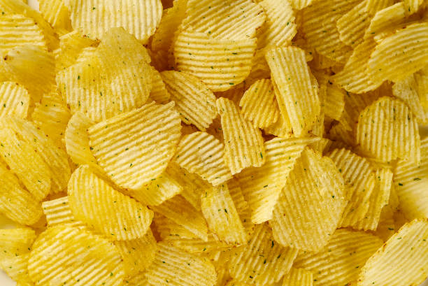 istock close up of Potato chips. chips background 1291141064
