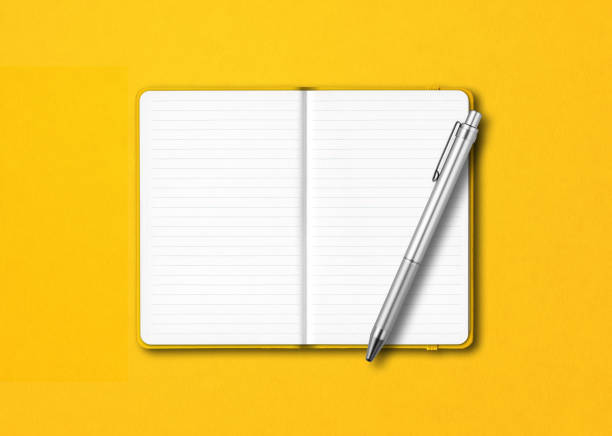 istock Yellow open notebook with a pen isolated on colorful background 1291142953