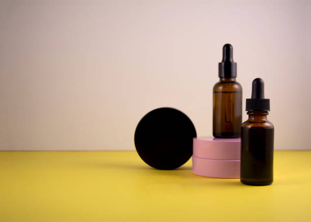 istock Jar of cream and bottle of serum 1291146292