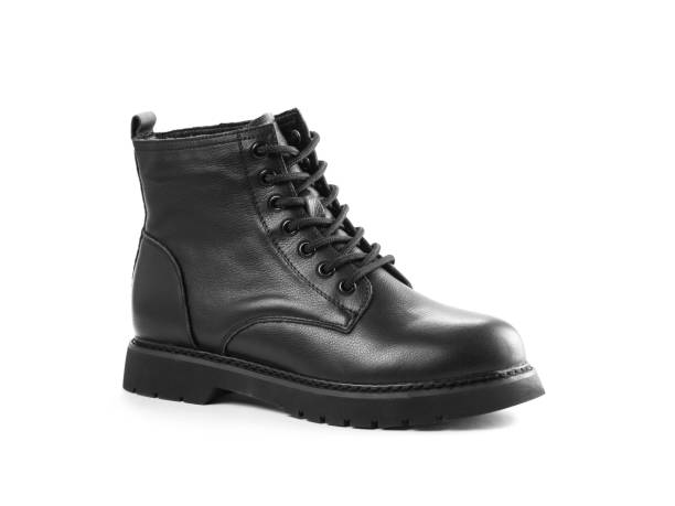 istock Black leather boots with laces. Close up. Isolated on a white background 1291147358