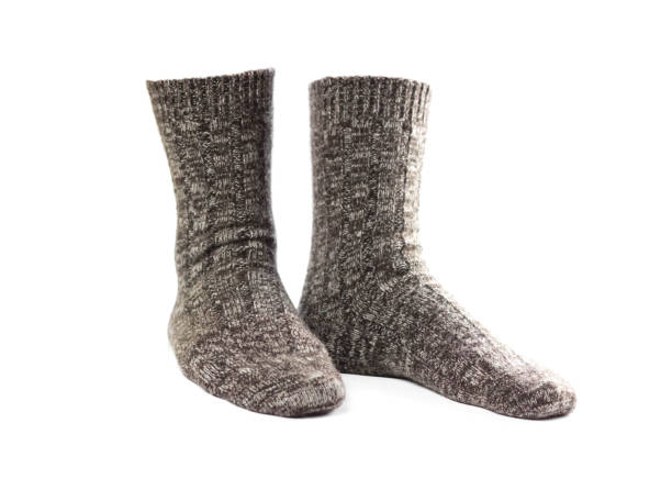 istock Wool socks. Close up. Isolated on a white background 1291147361