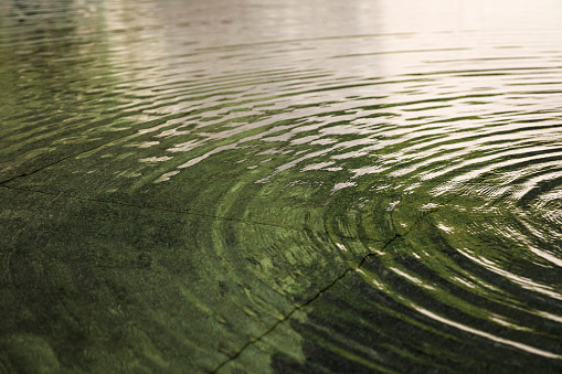 Circular waves on quiet waters