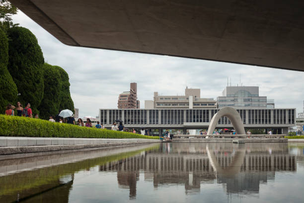 An atom bomb site peace park with the Museum in the background. Hiroshima. Japan