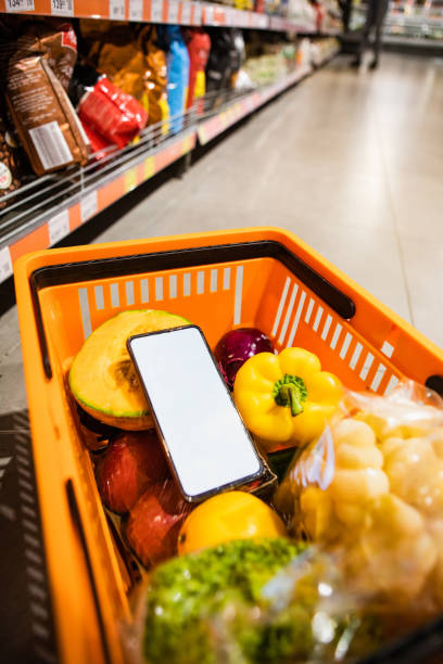 istock phone with white screen in grocery basket 1291155565