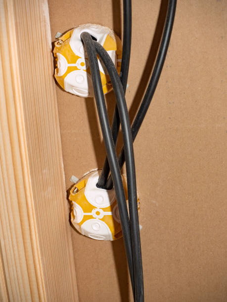 istock Electrical sockets in a wooden building from the back. Preparation for electrical sockets 1291161415