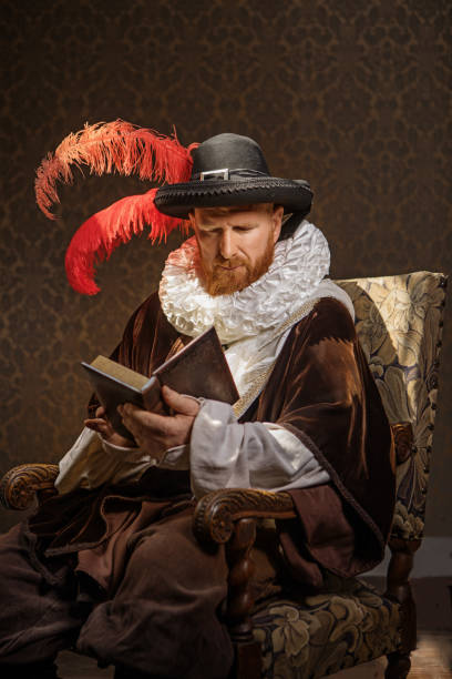 istock Redhead traditional dutch man by candlelight 1291166000