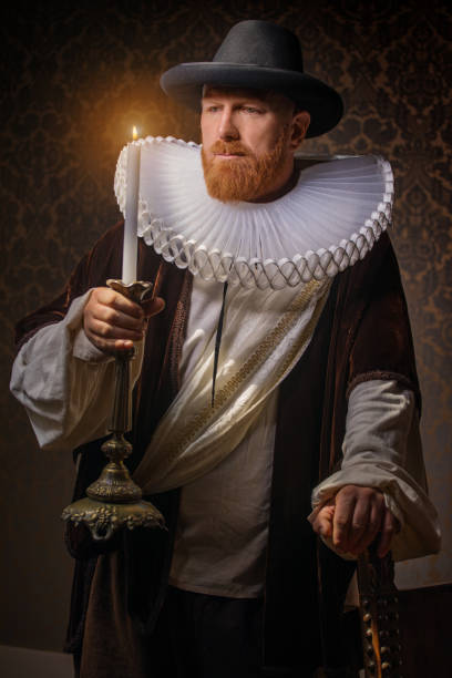 istock Redhead traditional dutch man by candlelight 1291166075