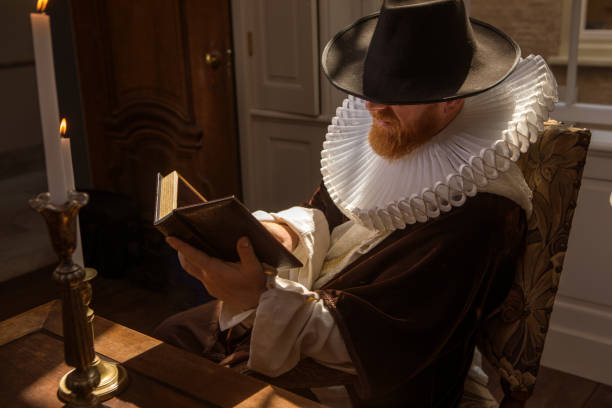 istock Redhead traditional dutch man by candlelight 1291166266