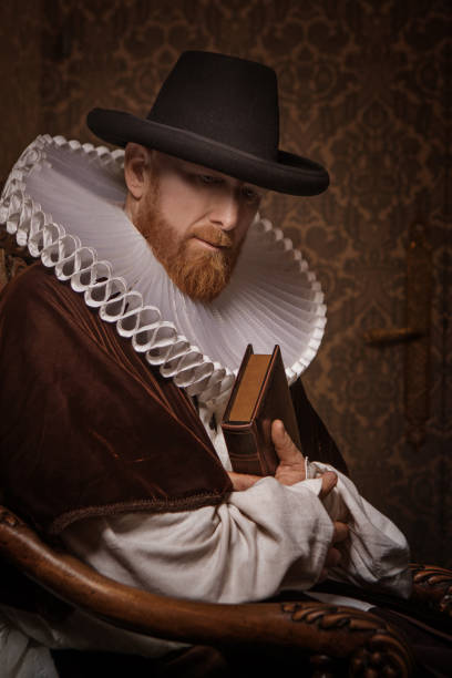 istock Redhead traditional dutch man by candlelight 1291166928
