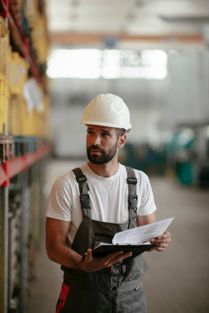 istock Man doing inspection on the production line. 1291167417