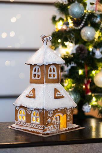 Homemade Christmas gingerbread house with Christmas decorations kit