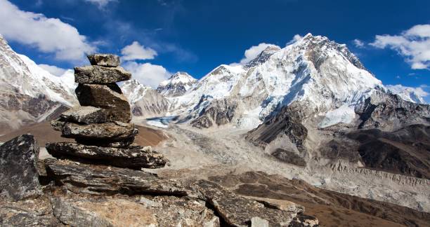 istock mount Everest and Nuptse with stone man or pyramid 1291172407