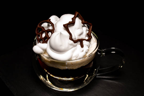 istock maple leaf, printed with chocolate on a 3D printer, on a cup of coffee 1291172689
