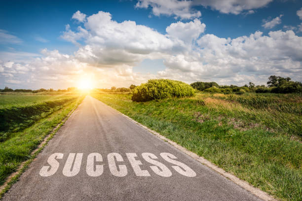 istock Success concept.  Way to success with a bright sun light on the horizon. 1291175190