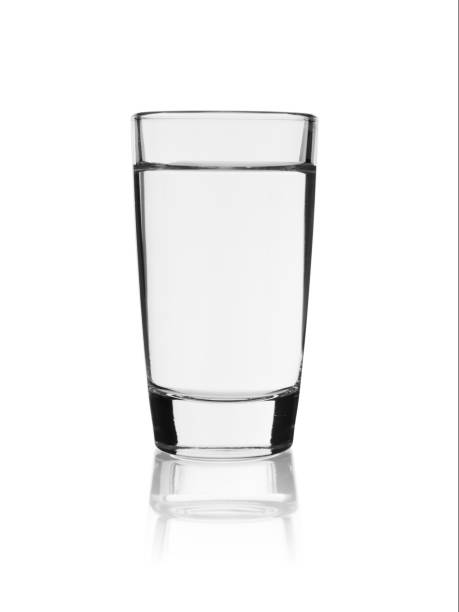 istock Shot of vodka on a white background with reflection 1291176504