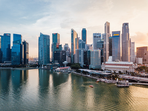 Singapore, November 03,, 2021. View from above, stunning aerial view of the Singapore skyline with the financial district in the distance during a beautiful sunset. Singapore, officially the Republic of Singapore, is a sovereign island city-state in maritime Southeast Asia.