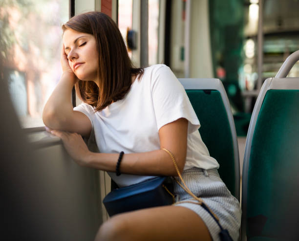 istock Girl sleeps sitting in tram 1291180300