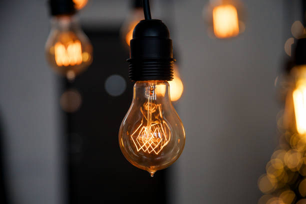istock Classic Edisson bulbs with bokeh backgound. Retro style bulbs. 1291180833