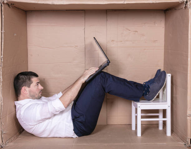 istock broken businessman in a cardboard office, stress and depression from overwork 1291183225
