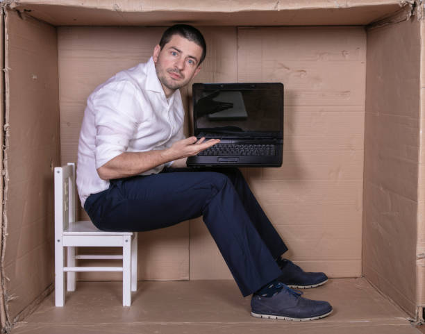 istock broken businessman in a cardboard office, stress and depression from overwork 1291183244