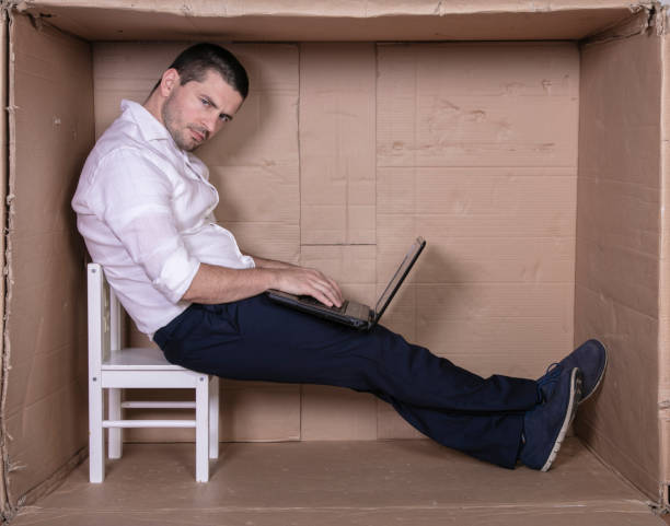 istock broken businessman in a cardboard office, stress and depression from overwork 1291183349
