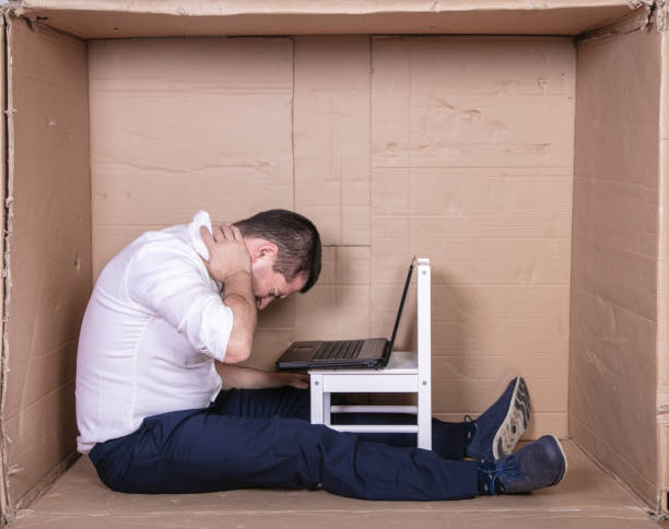istock broken businessman in a cardboard office, stress and depression from overwork 1291183403