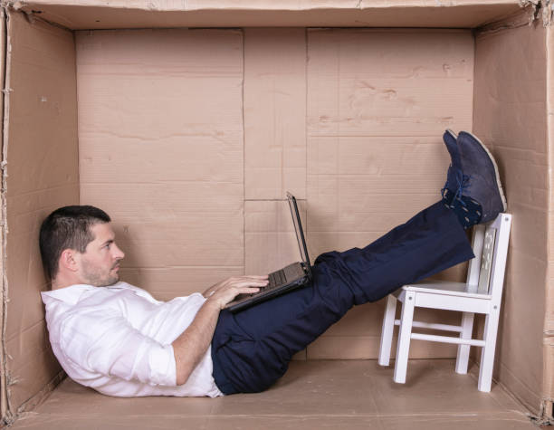 istock broken businessman in a cardboard office, stress and depression from overwork 1291183454