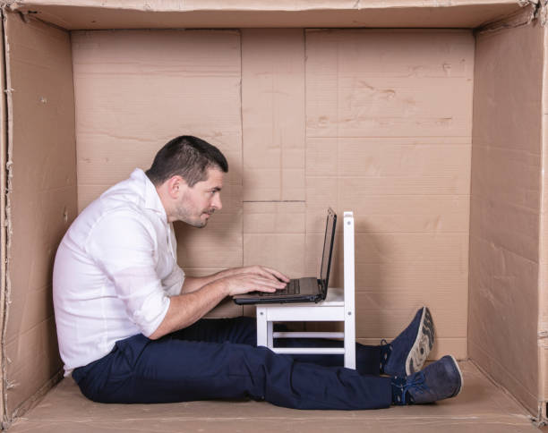 istock broken businessman in a cardboard office, stress and depression from overwork 1291183471