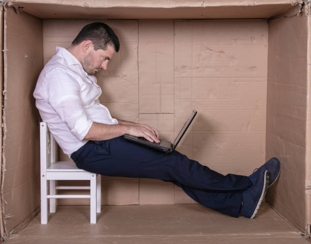 istock broken businessman in a cardboard office, stress and depression from overwork 1291183500