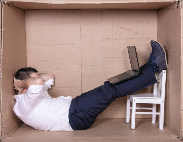 istock broken businessman in a cardboard office, stress and depression from overwork 1291183746