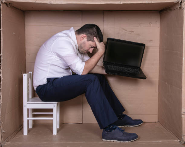 istock broken businessman in a cardboard office, stress and depression from overwork 1291183770