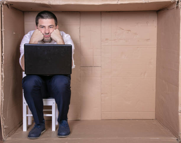 istock broken businessman in a cardboard office, stress and depression from overwork 1291183870