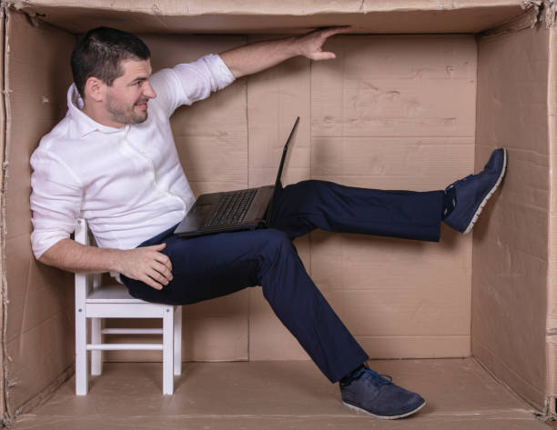 istock broken businessman in a cardboard office, stress and depression from overwork 1291183921
