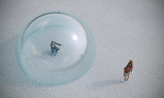 A mother looking to her family in glass dome bubble, symbolizing quaratine, social distance concept. ( 3d render )