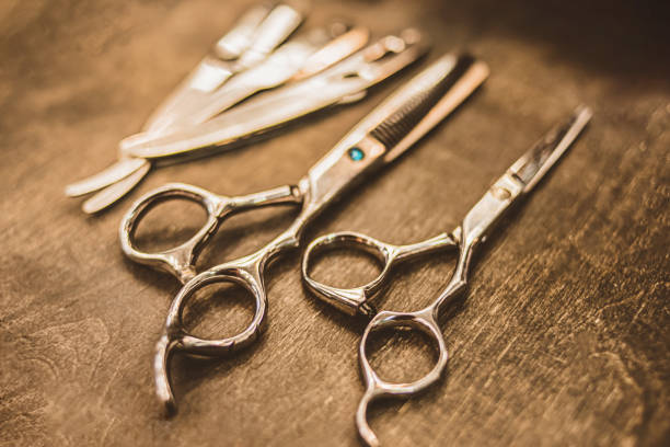 istock combs and scissors for haircuts lie on a shelf in the cabin 1291188135