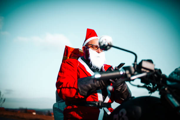 istock Santa Claus on Motorcycle 1291188245