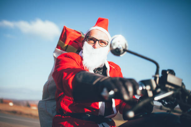 istock Santa Claus on Motorcycle 1291188891