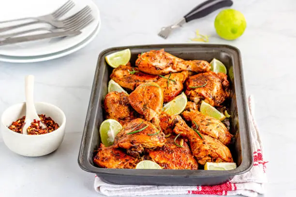 Baked Chicken with Rosemary, Lemon zest and Lemon,