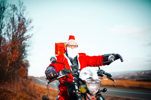 istock Santa Claus on Motorcycle 1291189033