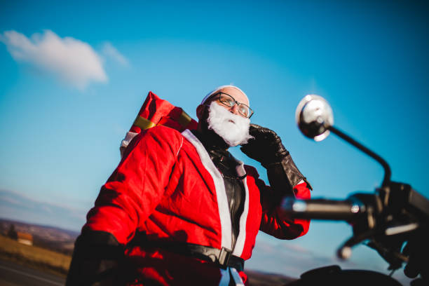 istock Santa Claus on Motorcycle 1291189073