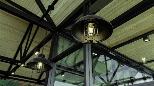 istock Incandescent lamp shining in cafe restaurent 1291190375