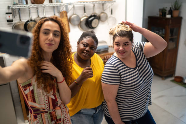 istock Friends taking a selfie together at home 1291192105