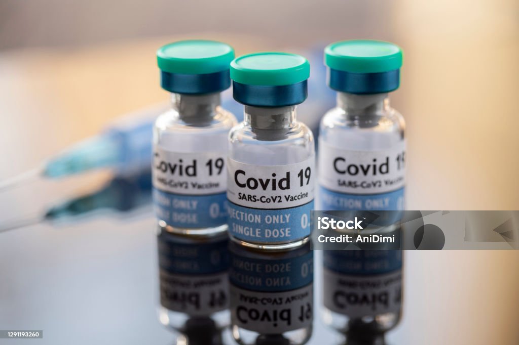 COVID-19 Vaccine COVID-19 Vaccines and syringe Alternative Medicine Stock Photo